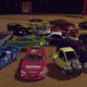 A collection of the cars Rich has helped bring to Assetto Corsa from other franchises, including Ridge Racer, Burnout and Gran Turismo. Front and center, in red, is the Kamata Fiera; left of it is the Soldat Raggio.